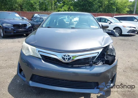 2012 Toyota Camry Le z USA, uszkodzony, nr VIN 4T4BF1FK2CR213908